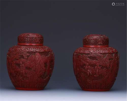 PAIR OF CHINESE CINNABAR FIGURES LIDDED JARS