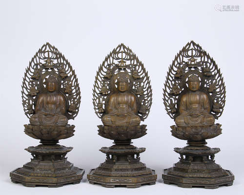 THREE CHINESE SANDALWOOD SEATED BUDDHA