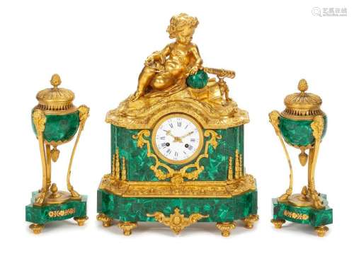 A French Gilt Bronze and Malachite Clock Garniture