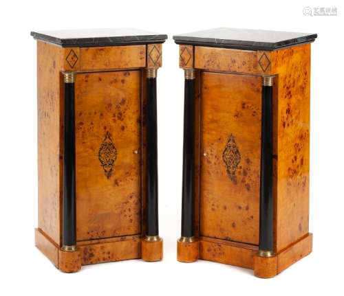 A Pair of Empire Style Parcel Ebonized Side Cabinets