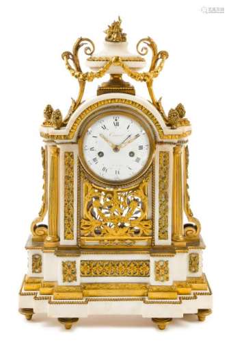 A Louis XVI Gilt Bronze Mounted Marble Mantel Clock
