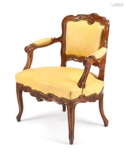 A French Provincial Oak Fauteuil Height 33 3/4 inches.