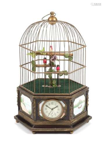 A Continental Automaton Porcelain Inset Birdcage with