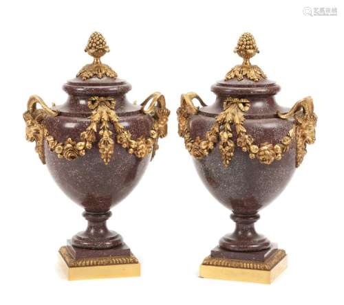 A Pair of French Gilt Bronze Mounted Porphyry Urns