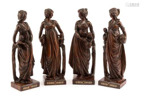 A Set of Four Italian Carved Wood Figural Groups Height