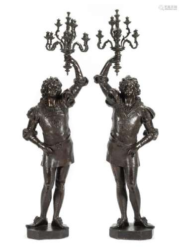 A Pair of Continental Carved Figural Torchieres Height