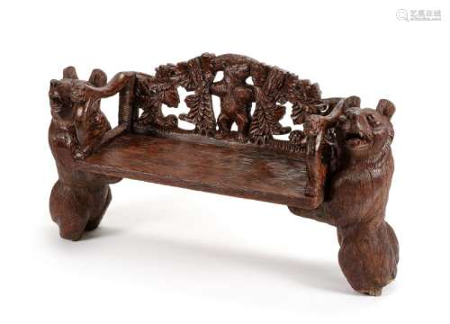 A Black Forest Carved Bench Height 24 x width 45 x