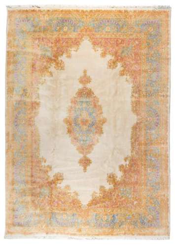 A Kirman Wool Rug 12 feet 4 inches x 8 feet 6 inches.