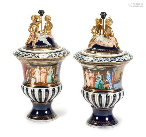 A Pair of Continental Porcelain Covered Urns Height