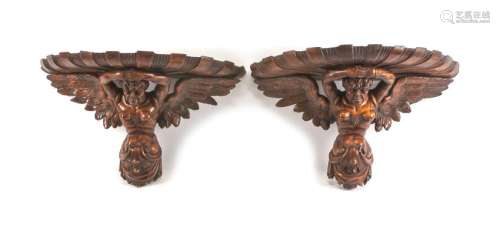 A Pair of Continental Carved Figural Brackets Height 16