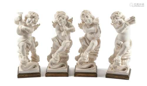 A Set of Four Italian Marble Figures of Musical Putti