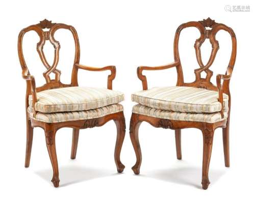 A Pair of Italian Fruitwood Armchairs Height 36 inches.