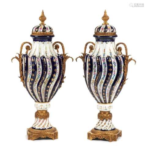 A Pair of Sevres Style Bronze Mounted Porcelain Urns