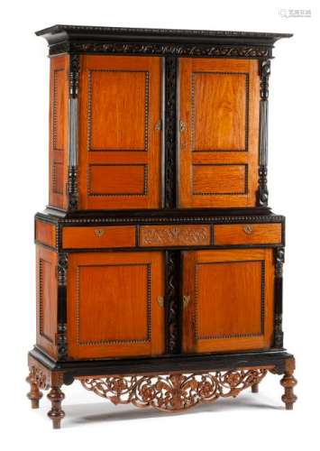 A Dutch Colonial Parcel Ebonized Satinwood Cabinet