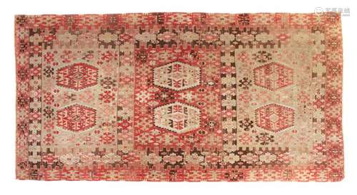 A Kilim Wool Rug 11 feet 1 inch x 6 feet 3 inches.