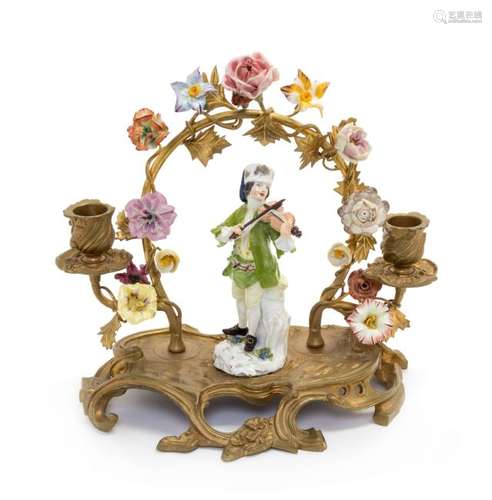 * A Meissen Porcelain Figure on a Gilt Metal