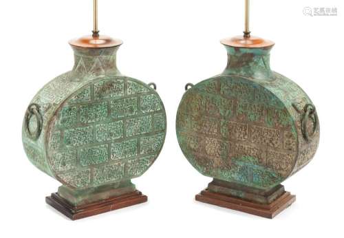 A Pair of Chinese Bronze Lamps Height 19 1/2 inches.