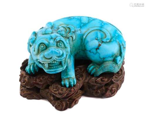 A Chinese Carved Turquoise Figure Height 1 1/2 inches.