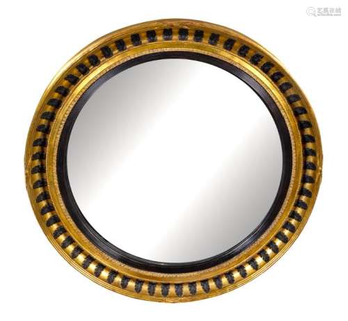 A Regency Style Parcel Ebonized Giltwood Mirror