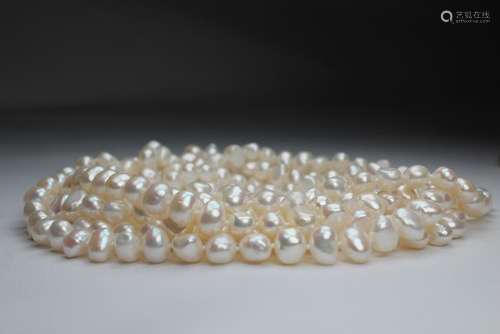 Unusual 100 inch Strand of White Freshwater Pearls