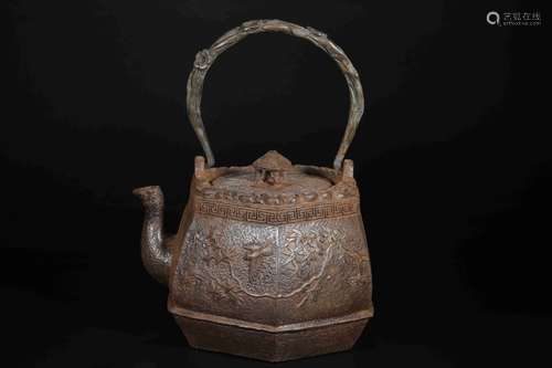 AN IRON TEAPOT