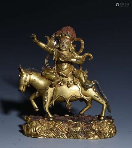 A GILT-BRONZE FIGURE OF BUDDHA