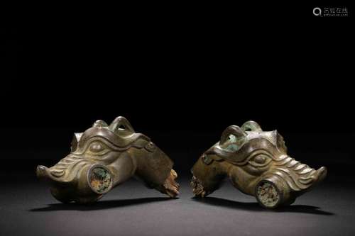 A PAIR OF BRONZE 'DRAGON' HEAD