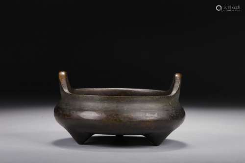 A BRONZE TRIPOD CENSER