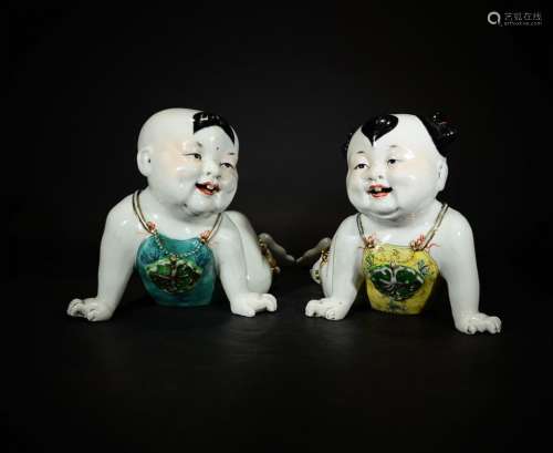 A PAIR OF FAMILLE ROSE PORCELAIN OF BOY AND GIRL