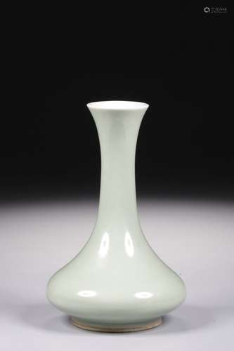 A CELADON BOTTLE VASE, KANGXI MARK