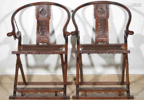A PAIR OF HUANGHUALI HORSE BACK CHAIRS