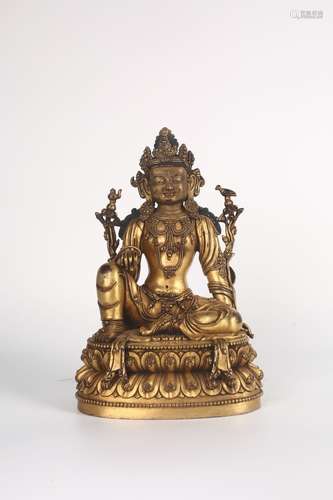 A GILT-BRONZE FIGURE OF AMITAYUS