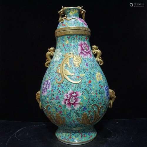 A Famille Rose and Gilt Decorated Porcelain Vase