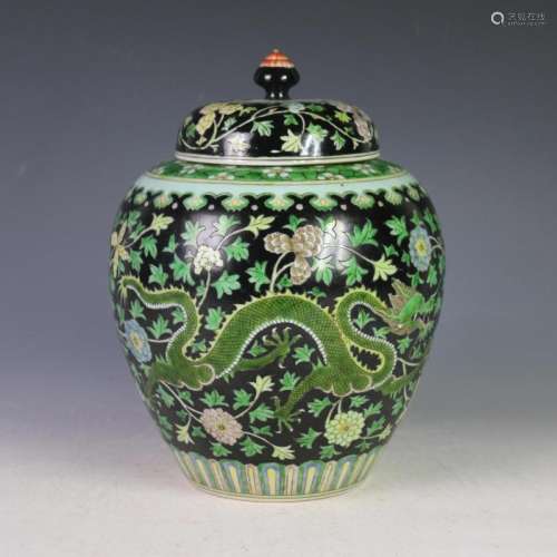 A Black and Green Porcelain Jar with Lid