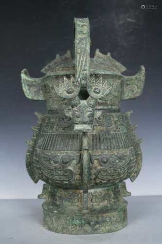 An Archaic Bronze Ritual Storage Vessel and Cover