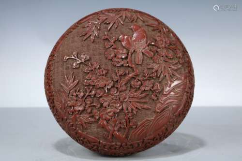 A Carved Cinnabar Lacquer Box and Cover