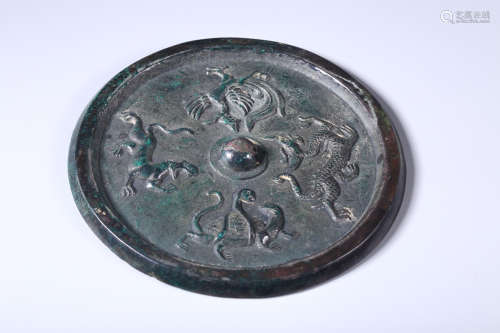 AN OLD GODS BRONZE MIRROR