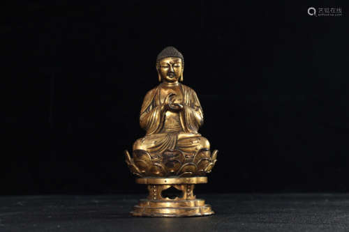 AN OLD TIBETAN GILT BRONZE BUDDHA DESIGN FIGURE