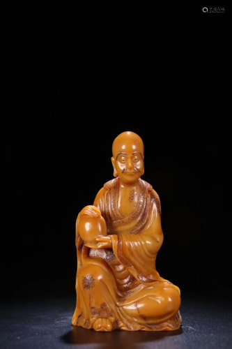 17-19TH CENTURY, A FIELD YELLOW STONE CARVED ARHAT STATUE,QING DYNASTY