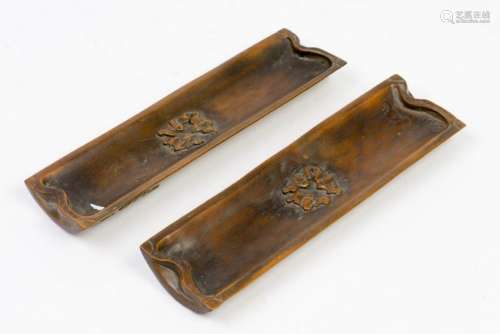 A PAIR OF ARM RESTS WITH FIGURE PATTERN
