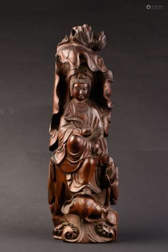 A HARDWOOD FIGURE OF GUANYIN