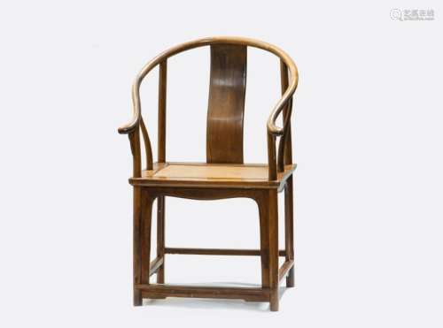 A HUANGHUALIÂ CONTINUOUS HORSESHOE-BACK ARMCHAIR (Y)