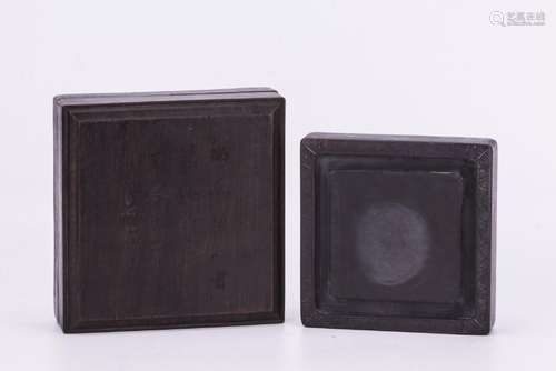 A CHINESE INKSTONE WITHIN A HARDWOOD BOX