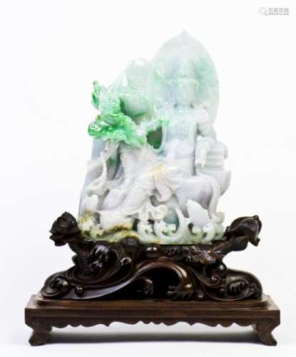 A 'SEATED GUAN YIN' JADEITE WITH STAND