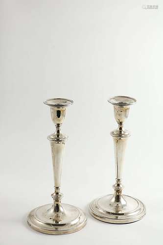 A pair of george iii candlesticks