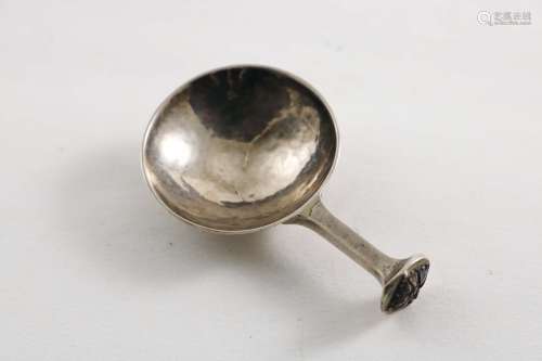 An early 20th century arts & crafts caddy spoon