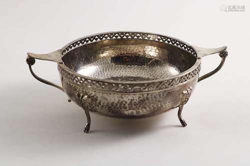 An early 20th century two-handled circular dish