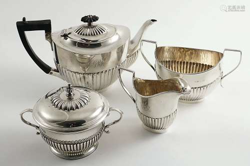 An edwardian three-piece tea set
