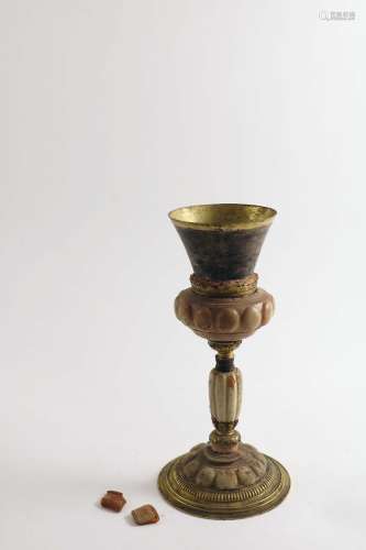 A 17th century continental gilt-metal mounted amber goblet