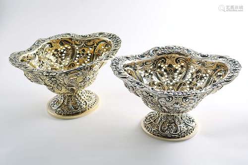 A matched pair of late victorian silvergilt bonbon dishes